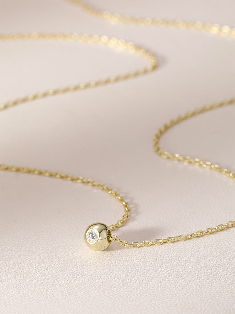 Small ball and diamond encrusted necklace gift idea